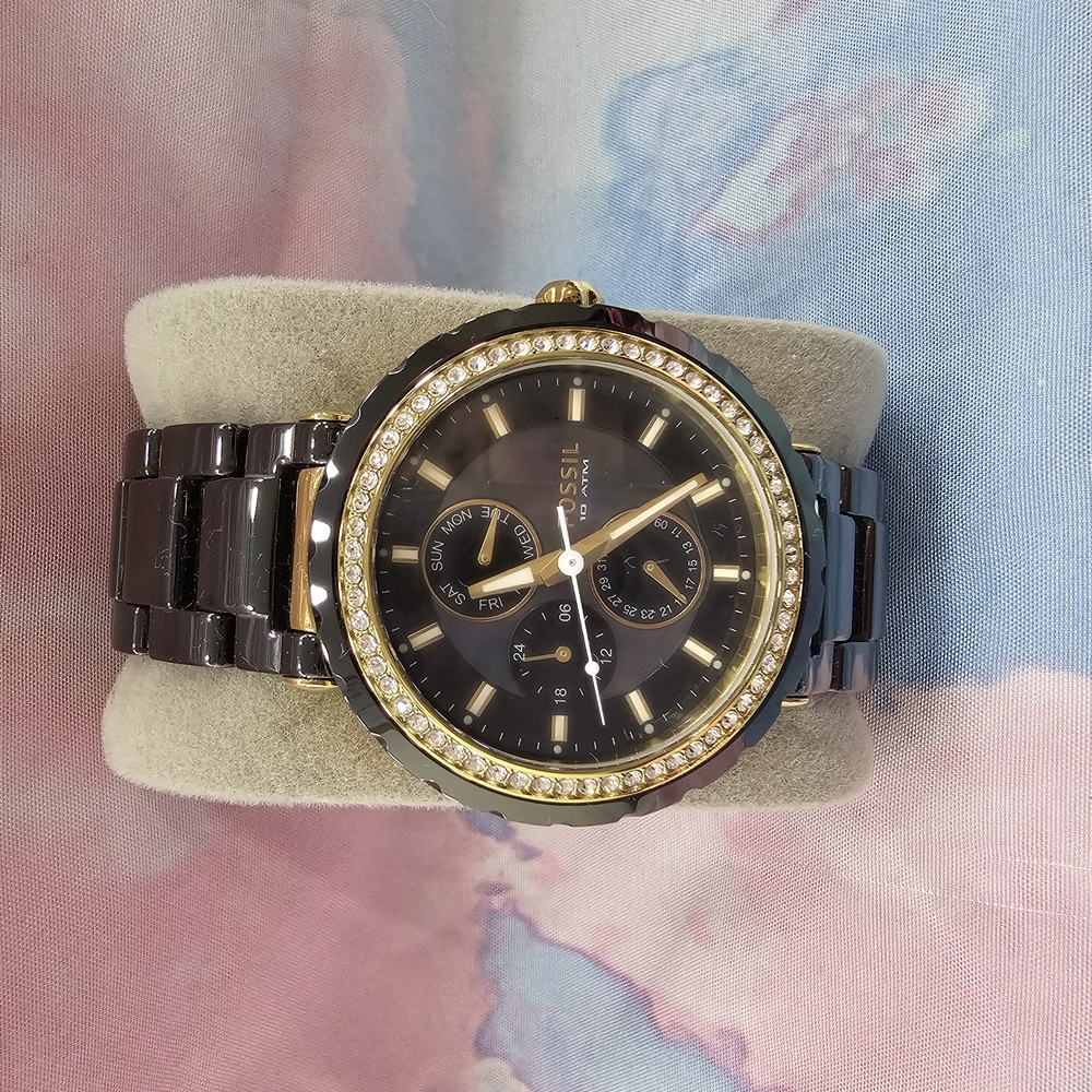 Fossil Women's Black and Gold Watch